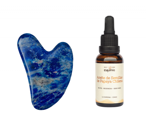 roca azul en forma de corazón de lapislázuli con botellla ambar de 30 ml de aceite de papaya marca elquimia